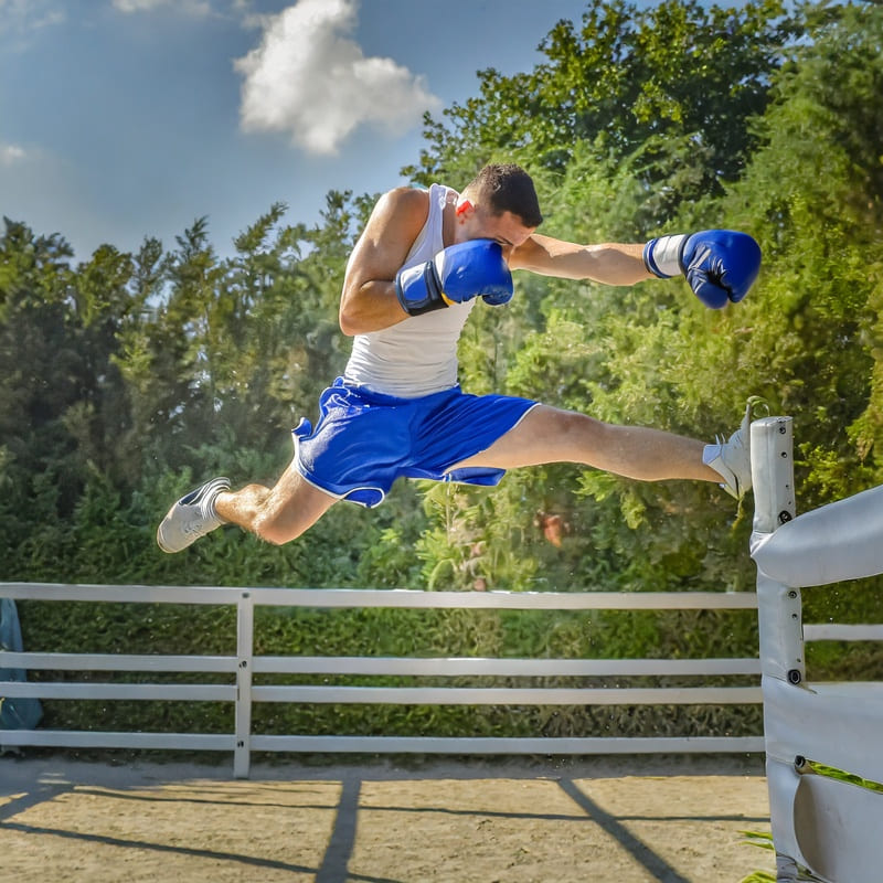 a jumping professional boxer in the ring 1